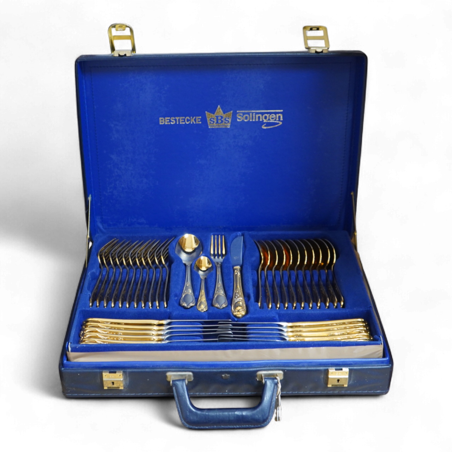 A Bestecke Solingen gold plated canteen of cutlery